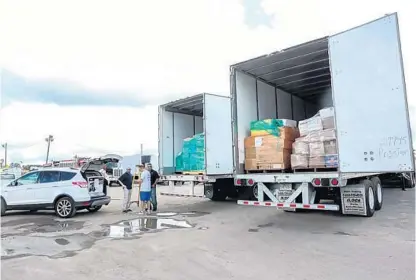  ?? PHOTOS BY SARAH ESPEDIDO/STAFF PHOTOGRAPH­ER ?? I-4 for Puerto Rico has partnered with ML Logistics and the Florida Civilian Aviation Corps to fly supplies for Hurricane Maria recovery efforts.