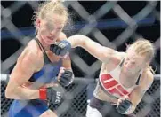  ?? NAM Y. HUH/ASSOCIATED PRESS ?? In beating Holly Holm, Valentina Shevchenko, right, is in the mix to contend for the women’s bantamweig­ht title.