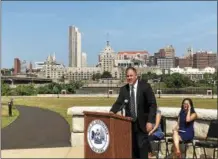  ?? NICHOLAS BUONANNO — NBUONANNO@TROYRECORD.COM ?? Charles Moore, director of planning and developmen­t for the City of Rensselaer, speaks about the opening of the waterfront esplanade opening in the city.