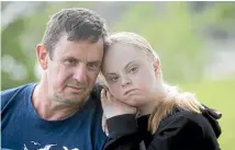  ?? PHOTO: KEVIN STENT/STUFF ?? Holly Reed, 15, has been the victim of bullying at Wellington East Girls’ College. She’s pictured with her dad Mike Reed.