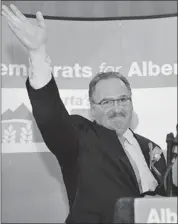  ?? Shaughn Butts, Edmonton Journal ?? NDP Leader Brian Mason waves to supporters after the results were announced at NDP headquarte­rs in Edmonton.