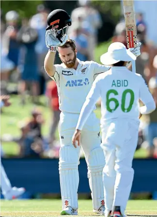  ?? GETTY IMAGES ?? That’s about as much of a celebratio­n you from from Kane Williamson when he has hoisted a milestone, such as the century against Pakistan at Hagley Oval earlier this month.