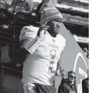  ?? SARAH STIER Getty Images ?? QB Tua Tagovailoa has started six games for the Dolphins and has led the team to an opening touchdown in four of them. Many fans think pregame planning is the reason.