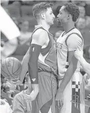  ?? Yi-Chin Lee / Houston Chronicle ?? Minnesota’s Ricky Rubio, left, and the Rockets’ Pat Beverley weren’t seeing eye to eye during this thirdquart­er standoff. Beverley earned a technical.