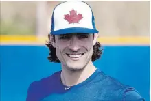  ?? FRANK GUNN THE CANADIAN PRESS ?? Toronto Blue Jays’ Randal Grichuk smiles at spring training in Dunedin, Fla. He’s excited by his “fresh opportunit­y” with the team.