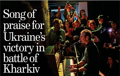  ?? ?? SWEET SOUNDS: Ukrainian singer Svyatoslav Vakarchuk sings during The Music of the Resistance concert at an art gallery in Kharkiv yesterday