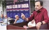  ?? PHOTO:PTI ?? NDTV founder Prannoy Roy addresses a meeting at Press Club of India in New Delhi on Friday against the CBI raids on his news channel in an alleged financial fraud case