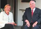  ?? AP ?? Angela Merkel with Helmut Kohl in Berlin in 2007.