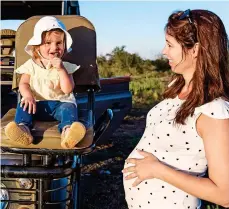  ??  ?? getting a taste for the wild life: Pregnant Emma took toddler Mary out on an evening game drive into the reserve