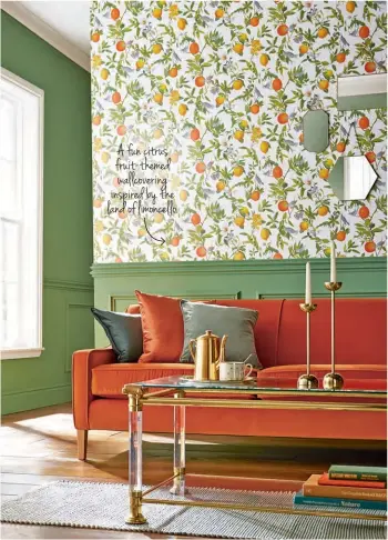  ??  ?? A fun citrus fruit-themed wallcoveri­ng inspired by the land of limoncello.