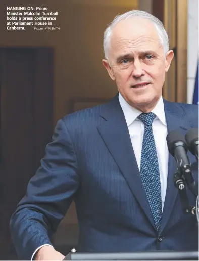  ?? Picture: KYM SMITH ?? HANGING ON: Prime Minister Malcolm Turnbull holds a press conference at Parliament House in Canberra.