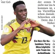  ??  ?? Ein Herz für Ko- lumbien: Yerry Mina köpfelte sein Team ins Achtelfina­le