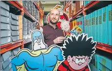  ?? ?? David Powell, head of archives, in the vault with some of DC Thomson’s most famous characters
Picture Andrew Cawley