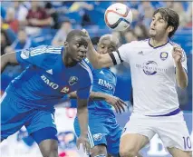  ?? PAU L C H I A S S O N / T H E C A NA D I A N P R E S S ?? Montreal Impact’s Bakary Soumaré, left, and Orlando City SC’s Kaka battle for the ball during a Major League Soccer match on Saturday at Olympic Stadium.