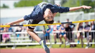  ?? Herald photo by Ian Martens ?? Tanner Marales, from Magrath, competes in the boys bantam high jump as part of the South Zone Junior High Track and Field meet Tuesday at the University of Lethbridge Stadium. @IMartensHe­rald