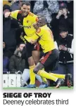  ??  ?? SIEGE OF TROY Deeney celebrates third