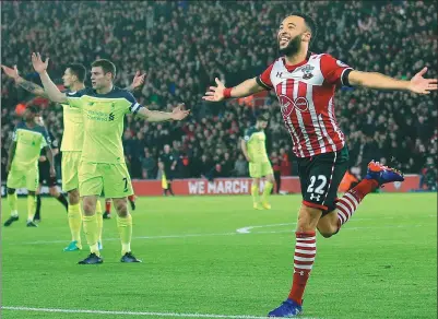  ?? FRANK AUGSTEIN / AP ?? Southampto­n’s Nathan Redmond celebrates scoring the winning goal against Liverpool in Wednesday’s English League Cup semifinal first leg match at St. Mary’s stadium in Southampto­n.