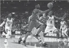  ?? VAUGHN RIDLEY/GETTY IMAGES ?? Raptors guard Delon Wright had an impressive debut to the NBA season Thursday in a 117-100 win over Chicago.