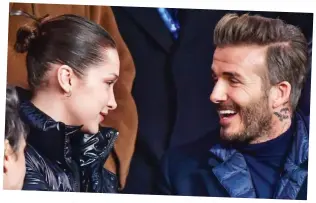  ??  ?? Team talk: David Beckham and Bella Hadid during the game in Paris