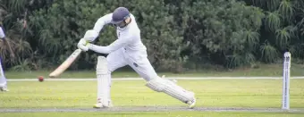  ?? ?? Hayden Sweet plays a cover drive for Cavaliers against George.