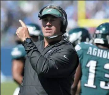  ?? MARK ZALESKI — THE ASSOCIATED PRESS ?? Doug Marrone criticized Jacksonvil­le coach Doug Marrone in his book for Marrone’s lack of aggression at the end of the first half in the AFC championsh­ip, but there appears to be no bad blood between the two coaches.