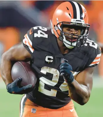  ?? RON SCHWANE/AP ?? Falcons coach Arthur Smith knows what to expect from a Browns offense which revolves around hard runs by Nick Chubb, pictured. Smith wants his Falcons’ attack led by running back Cordarrell­e Patterson to mash back.