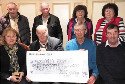  ??  ?? A €1,000 cheque for the Leukemia Trust. Seated: Kathleen Walsh, John O’ Sullivan, 31 drive founder; Davy Walsh and Donie Cremins, Back row: Tom Brennan, Jack Kelly, Ann McGillicud­dy and Mary O’Donovan. Kathleen Walsh, John O Sullivan, Davy Walsh, Donie...