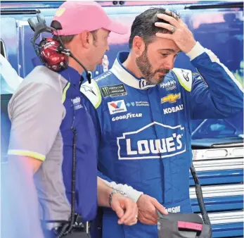  ?? ADAM HAGY, USA TODAY SPORTS ?? Seven-time NASCAR Cup Series champion Jimmie Johnson, right, enters Sunday’s eliminatio­n race at Kansas in eighth place, seven points above the cutoff.