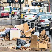  ?? ?? Rubbish piles up in a Glasgow street last week. Thomas Kerr, the leader of the council Tory group, said the city had become the ‘fly-tipping capital of Britain’