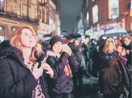  ??  ?? Crowds enjoying Lumiere. Photo by Matthew Andrews