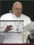  ?? Associated Press ?? Pope Francis reads his message during the Angelus noon prayer Sunday.