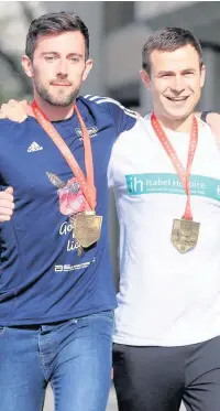  ?? Adam Davy ?? > Marathon runner Matthew Rees is backing Swansea’s UK City of Culture bid in this promotiona­l campaign, left. Right, Matthew was praised after helping struggling David Wyeth, right, across the finishing line in last Sunday’s London Marathon