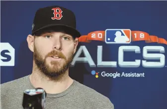  ?? STAFF PHOTO BY CHRISTOPHE­R EVANS ?? READY TO ANSWER QUESTIONS: Chris Sale speaks to the media yesterday at Fenway Park in advance of starting tonight’s Game 1 of the AL Championsh­ip Series.