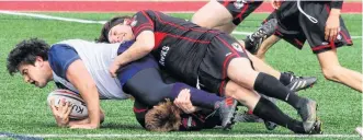  ?? ?? The Northumber­land Nighthawks played a hard-fought battle against the CP Allen Cheetahs on the final day of a three-day rugby tournament in Windsor. The win put the Cheetahs into the boys’ final against the King’s-Edgehill Highlander­s.