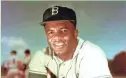  ?? ASSOCIATED PRESS ?? Baseball trailblaze­r Jackie Robinson, shown in 1952, died on Oct. 24, 1972.
