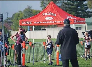  ?? ?? Winner: Mason Beattie crossing the finish line in his time trial.