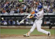  ?? FRANK FRANKLIN II — ASSOCIATED PRESS ?? New York Mets’ Michael Conforto hits two-run single during Tuesday’s win over Padres.