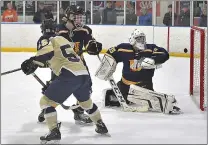  ?? PETE BANNAN — MEDIANEWS GROUP ?? West Chester Rustin’s Alex Crook (55) reacts as the puck deflects past Unionville goalie Keigan Craig with less than two minutes remaining in the second period Wednesday night.