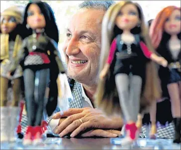  ?? Christina House Los Angeles Times ?? ISAAC LARIAN, shown with a line of Bratz dolls in 2010, has sought to merge his MGA Entertainm­ent Inc. with his crosstown rival in El Segundo. Mattel rebuffed him and told him not to bother trying again.