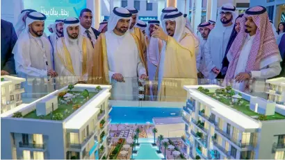  ?? — Photo by M. Sajjad ?? Sheikh Abdullah bin Salem bin Sultan Al Qasimi visiting the Ajmal Makan stall after inaugurati­ng the Acres Real Estate Investment Exhibition at Expo Centre Sharjah on Tuesday. The value of real estate deals in the emirate totalled Dh22.5 billion last year.