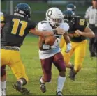  ?? PETE BANNAN — DIGITAL FIRST MEDIA ?? Oxford’s Tim Farber runs in a game against Interboro. The Hornets could move to 3-0 for the first time in more than 20 years.