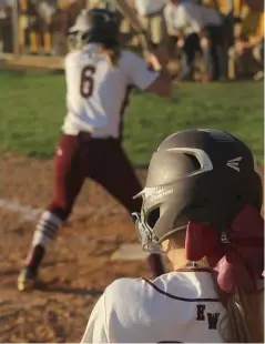  ?? (Photo by Olivia Zeringue, for Starkville Daily News) ?? Jessica Davis watches from the on deck as Jennah Pate bats for East Webster against East Union on Monday.