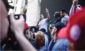  ??  ?? Tommy Robinson speaks to supporters outside the Old Bailey in London this month. Photograph: Peter Summers/Getty Images