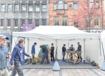  ??  ?? Practical skills Work in traditiona­l building crafts showcased in city centre