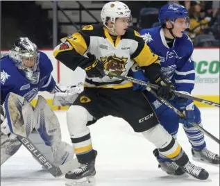  ?? CATHIE COWARD, THE HAMILTON SPECTATOR ?? Hamilton’s new defenceman Riley Stillman works the front of the Steelheads net before scoring a goal.