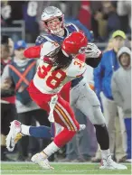  ?? STAFF FILE PHOTO BY NANCY LANE ?? UNWELCOME BREAK: Rob Gronkowski was dominant against Kansas City last Sunday night, but seems unlikely to play today in Chicago after a back injury kept him from traveling with the team.
