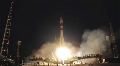  ??  ?? KAZAKHSTAN: Russia’s Soyuz MS-05 rocket carrying a three-man crew from Italy, Russia and the United States, blasts off from the Baikonur cosmodrome for a five-month mission on the Internatio­nal Space Station (ISS).—AFP