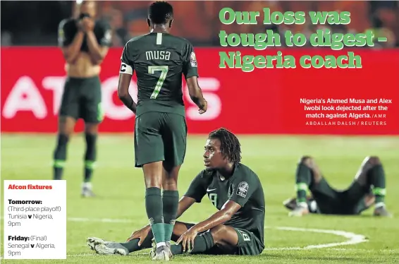  ?? /AMR ABDALLAH DALSH / REUTERS ?? Nigeria’s Ahmed Musa and Alex Iwobi look dejected after the match against Algeria.