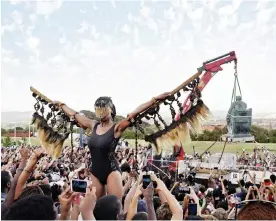  ?? ?? ‘I was very scared’ … Sethembile Msezane as a bird at the statue’s toppling; this is reenacted at South London Gallery’s Acts of Resistance show. Photograph: Courtesy of the Artist