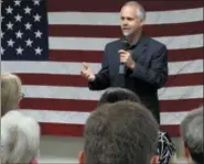  ?? JOHN HANNA — THE ASSOCIATED PRESS FILE ?? In this file photo, then-Rep. Tim Huelskamp, R-Kan., speaks during a campaign town hall meeting at the headquarte­rs of Patriot Outfitters, which sells firearms, accessorie­s and hunting and military gear in St. Marys, Kan. The Republican newcomers...